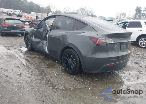 2021 Tesla Model Y Standard Range Rear-Wheel Drive from USA, damaged, VIN 5YJYGDED2MF174984